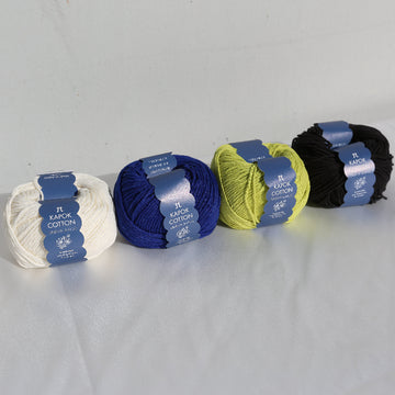 kapok cotton in front of the white wall